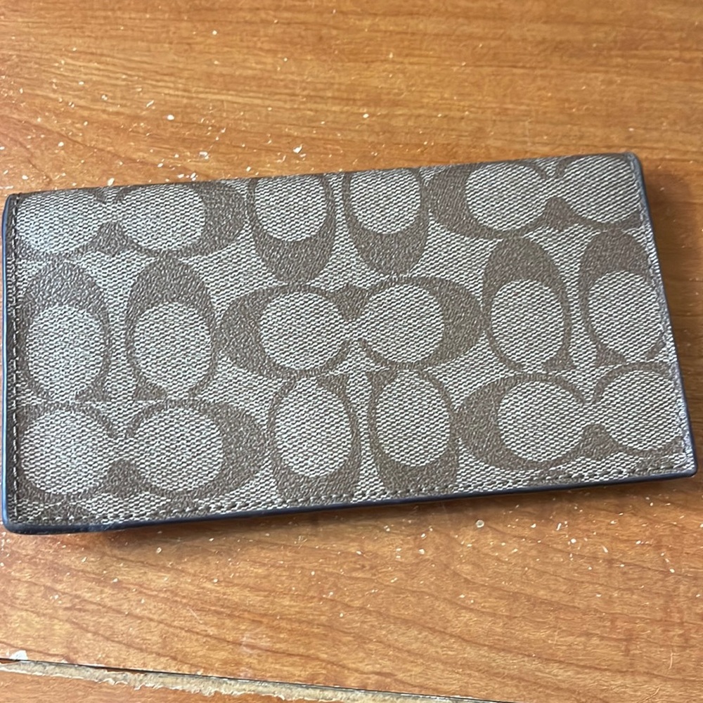 Coach wallet & checkbook holder. Gently used. Bought directly from Coach outlet.